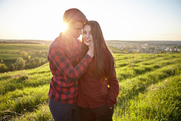 Young couple in countryside - 写真・画像