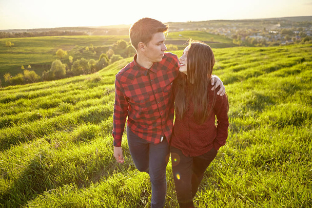 Young couple in countryside - 写真・画像
