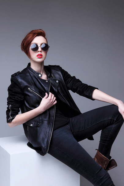 Redhead model in sunglasses - Фото, изображение