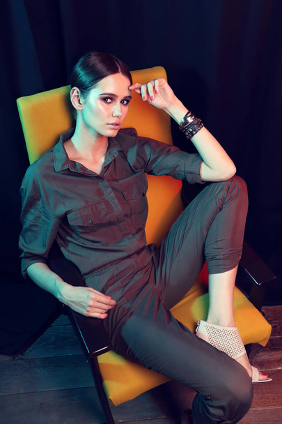 elegant woman in armchair - Valokuva, kuva