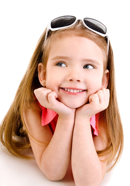 Portrait of smiling cute little girl isolated  - Фото, изображение