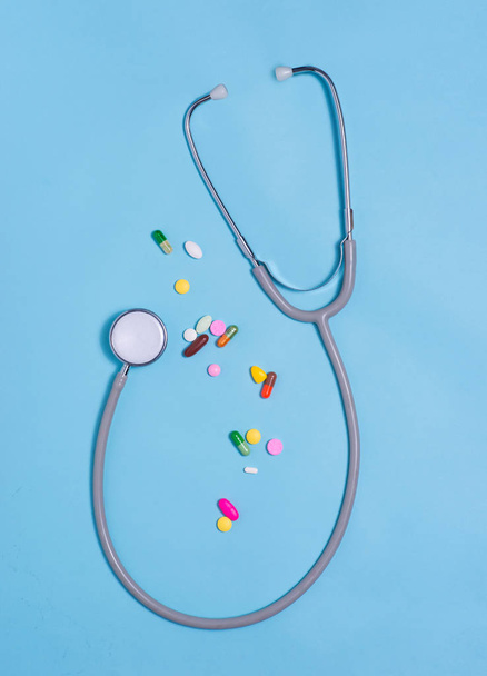 Colored pills with stethoscope - Photo, Image