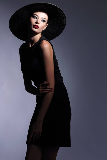 woman in black hat and dress - Photo, Image
