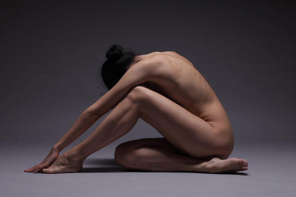 beautiful nude woman practicing yoga - Photo, Image