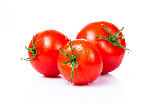 Tomatoes  isolated on white - 写真・画像