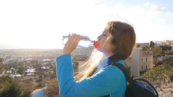 Woman tourist drinking water - Footage, Video