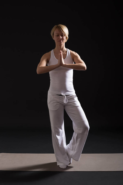 Woman practicing yoga - Photo, image