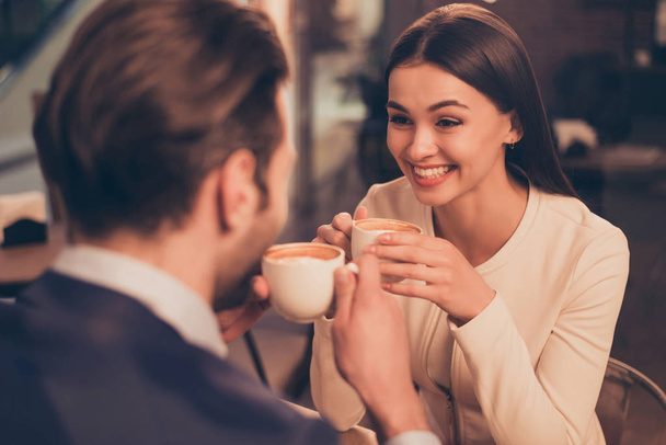 Happy romantic couple sitting in a cafe with coffee - Zdjęcie, obraz
