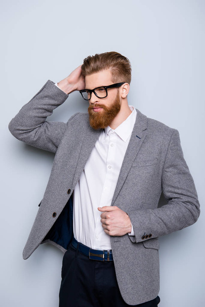 Vertical portrait of young handsome red  bearded man wearing jac - Foto, imagen