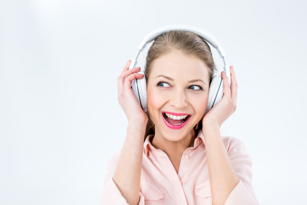 Woman listening music with headphones - Fotografie, Obrázek