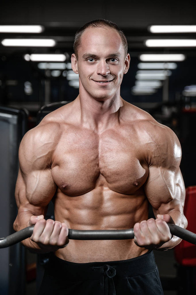 young man train in gym healthcare lifestyle sexy caucasian ma - 写真・画像