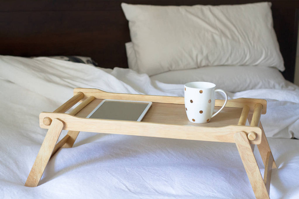 digital tablet technology and coffee in bed - Photo, image