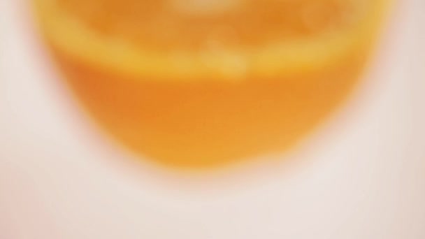 Half of fresh orange on white background - Video, Çekim