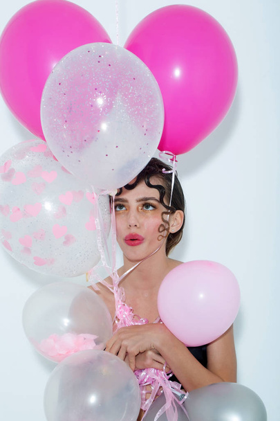 Pretty girl with party balloons - Фото, изображение