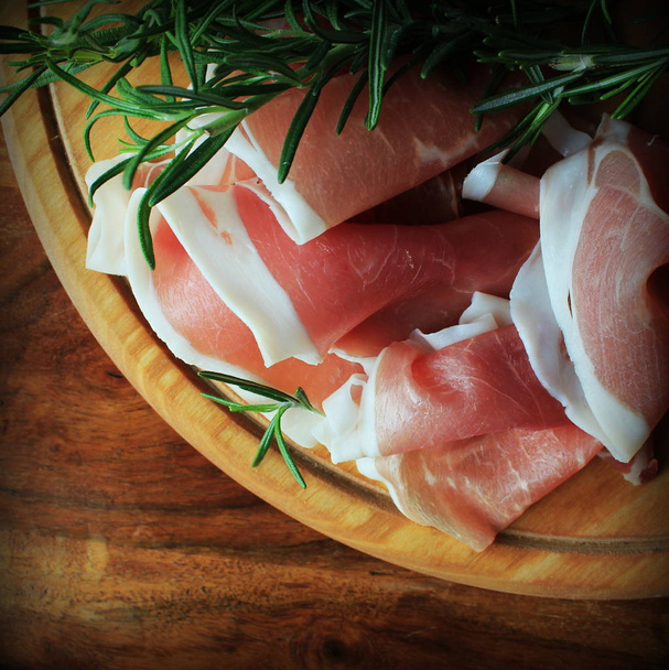 slices of ham on a cutting board - Photo, Image