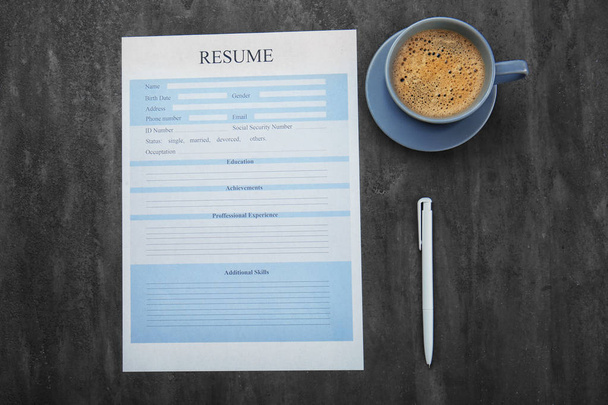 Resume and cup of coffee  - Φωτογραφία, εικόνα