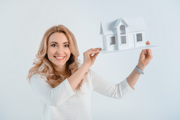 woman with house model - Photo, Image