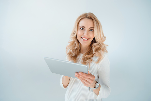 Woman using digital tablet  - Fotó, kép
