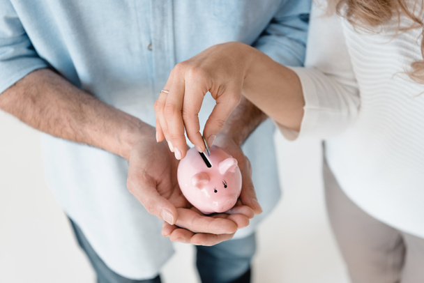 Mature couple with piggy bank  - Photo, Image