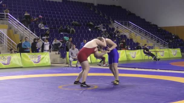 Orenburg, Russia  March 16, 2017 year: Boys compete in freestyle wrestling  - Záběry, video