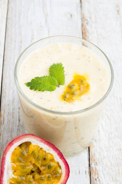 Smoothies passion fruit, milk in glass  - Photo, Image