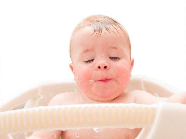 Happy baby boy enjoying water in bathtub - Zdjęcie, obraz