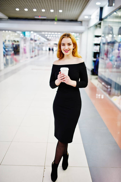 Fashion red haired girl wear on black dress with bright make hol - Zdjęcie, obraz