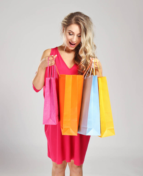 Woman with shopping bags   - Valokuva, kuva