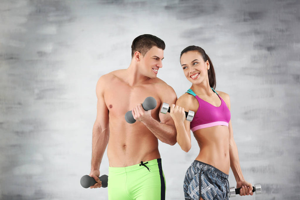 Sporty young couple training together  - Zdjęcie, obraz