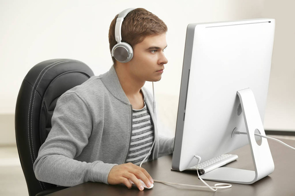 Teenager playing computer game  - Φωτογραφία, εικόνα