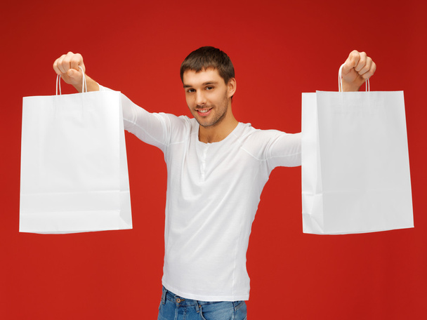 Man with shopping bags - Photo, image