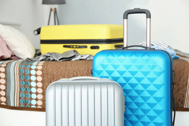 Packed travel suitcases at home - Foto, Imagen