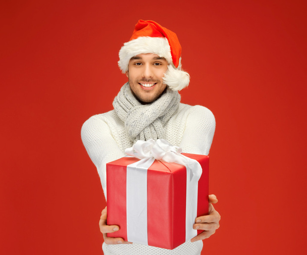 Handsome man in christmas hat - Photo, Image