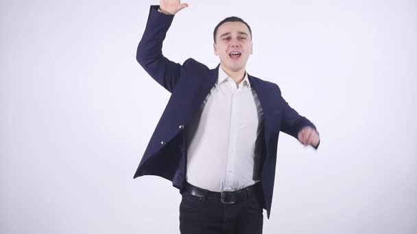 man getting excited by results on white background - Кадры, видео