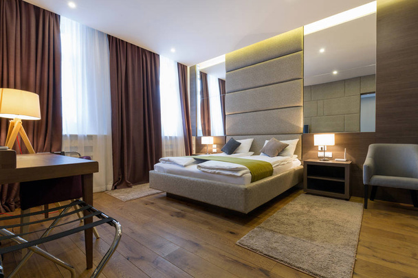 Interior of a modern hotel bedroom - Photo, Image