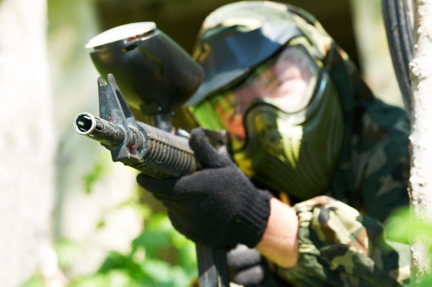 paintball player in summer. Shallow DOF - Фото, изображение