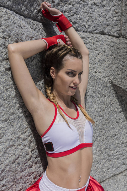 Young sporty woman in a sexy sportswear - Fotografie, Obrázek