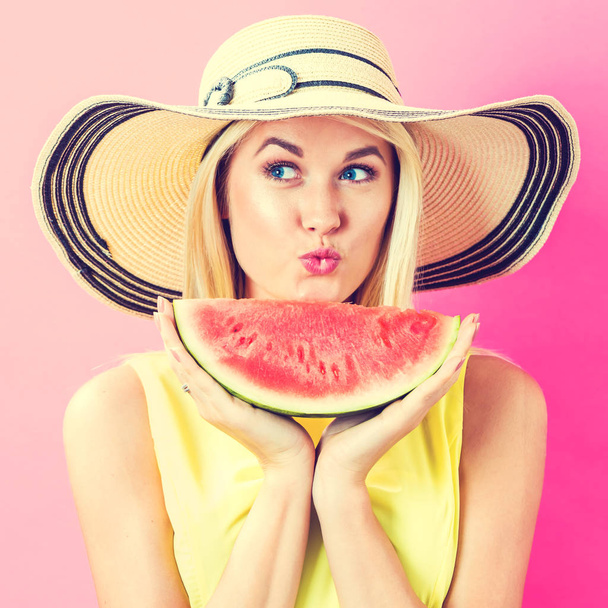 Woman holding watermelon - Фото, изображение