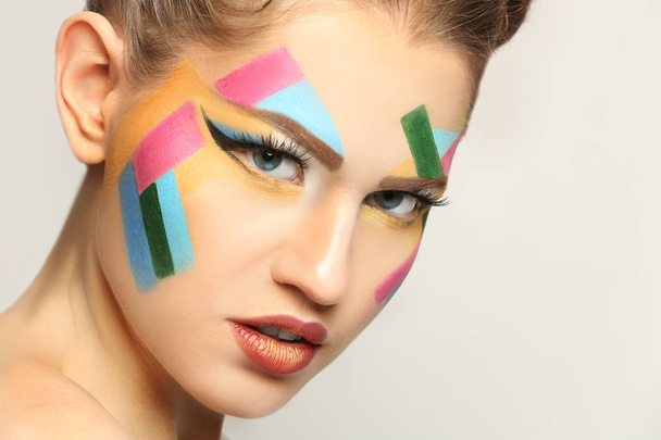 young woman with creative make up - Valokuva, kuva