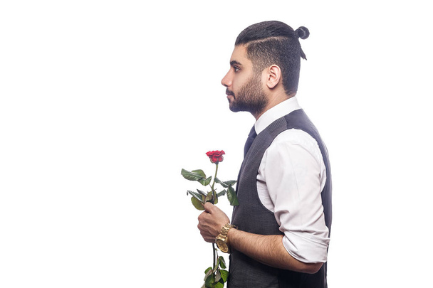Handsome romantic happy man with rose flower.  - Fotoğraf, Görsel