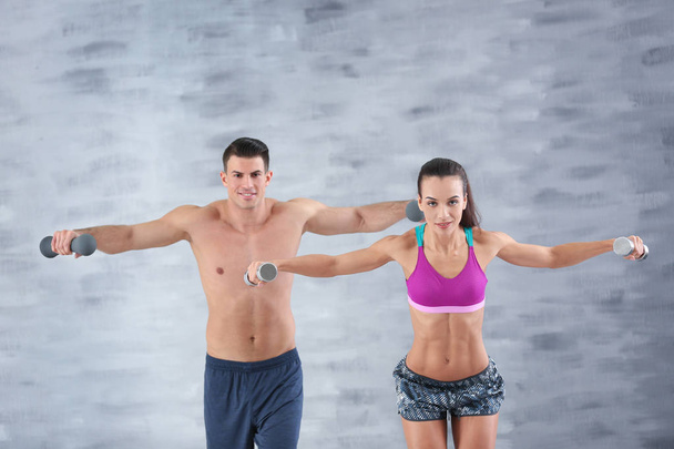 young couple training together - Foto, Imagen