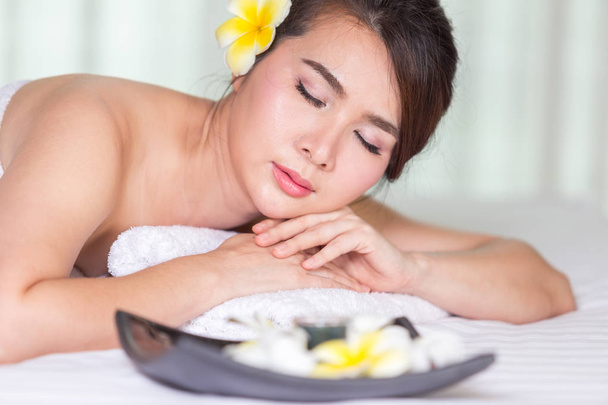 Spa beauty skin treatment woman on white towel. Gorgeous beautif - Fotó, kép