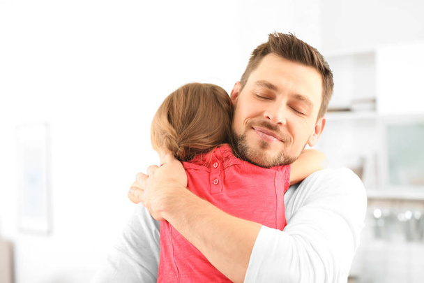 Girl embracing father  - Фото, изображение