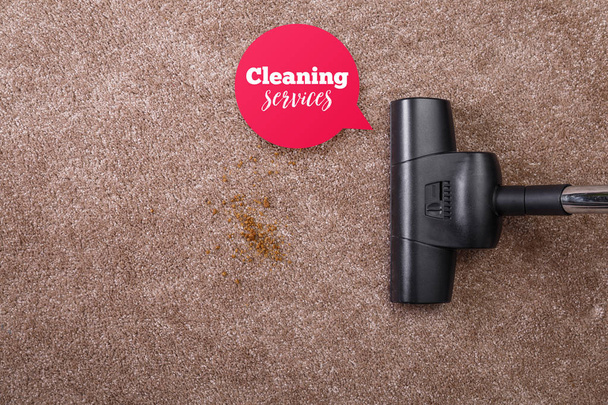 Vacuuming carpet with vacuum cleaner. Housework. - Фото, изображение