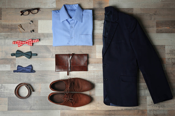 Flat lay set of male clothes - 写真・画像