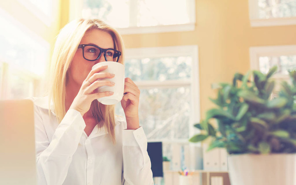 businesswoman drinking coffee  - Photo, Image