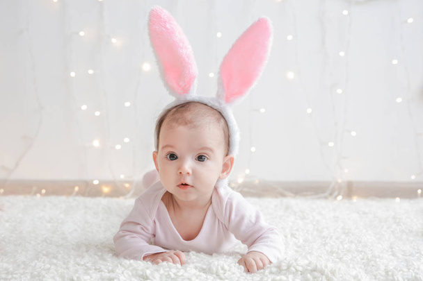 baby with bunny ears - Фото, изображение
