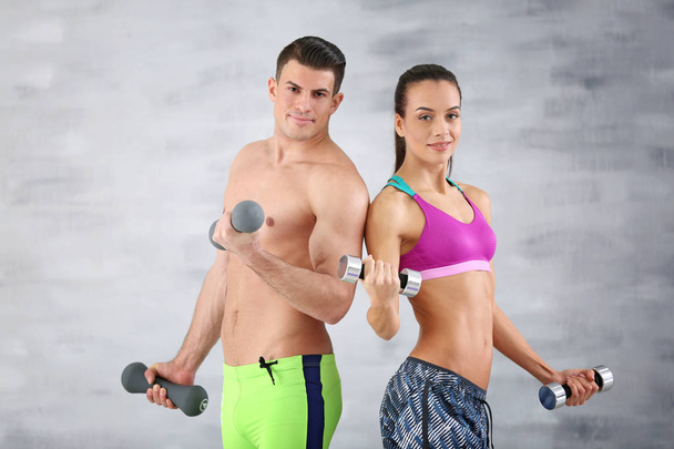 Sporty young couple training together  - Valokuva, kuva
