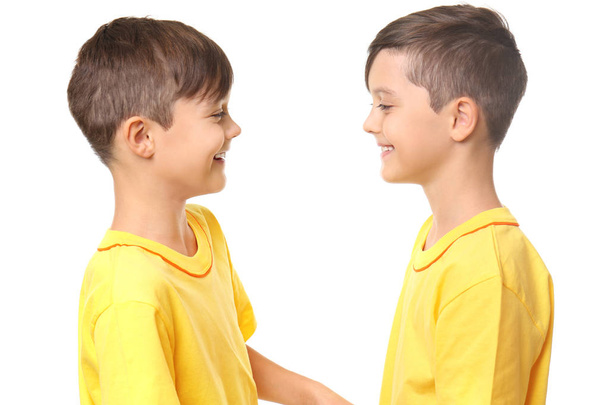 Twin brothers on white background - Foto, imagen