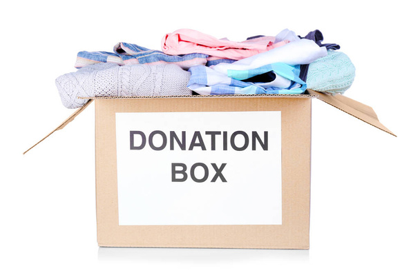 Donation box with clothes - Фото, изображение